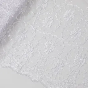 White lace fabric with embroidery in floral design